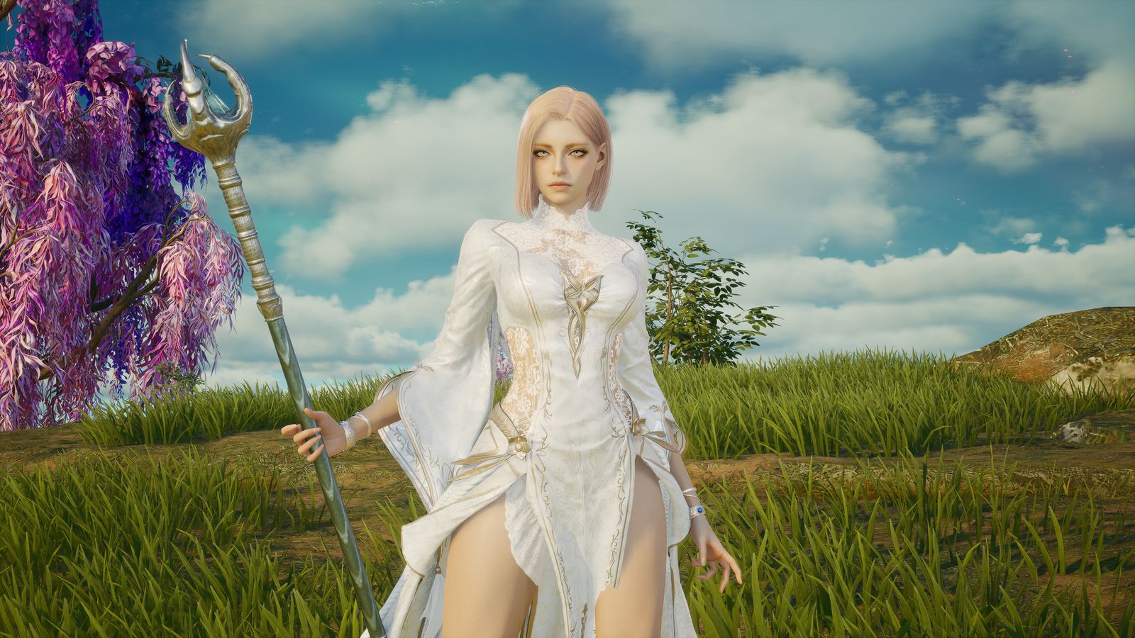 A robed Daeva holding a staff in a grassy field in AION 2 — official screenshot